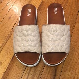 Leather strapped slides